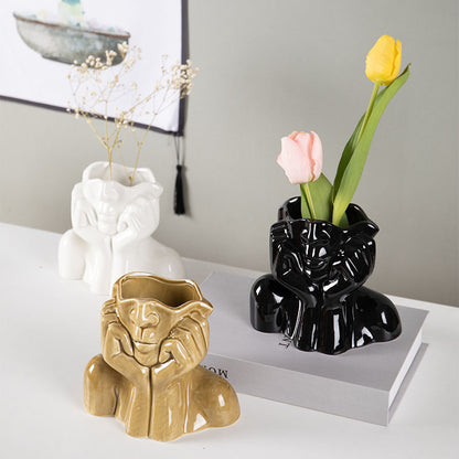 Elegant Ceramic Flower Vases & Sculptures