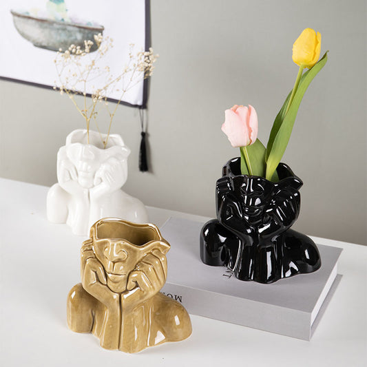 Elegant Ceramic Flower Vases & Sculptures